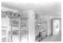 SA0506 - Photograph shows a storage area for various wooden materials.